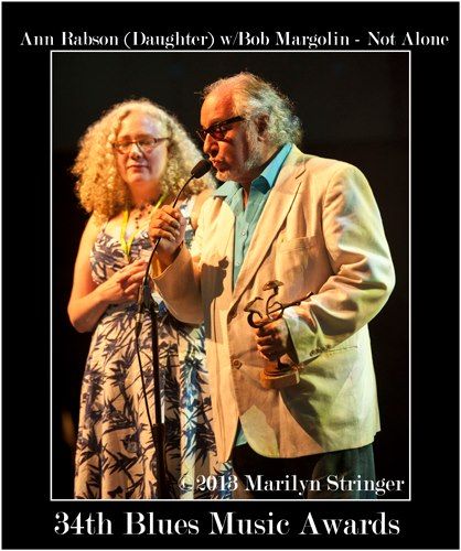 Liz Schnore (Ann's daughter) and Bob Margolin accept the BMA for 2013 Acoustic Album of the Year.